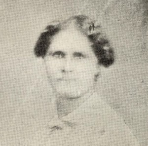 Image description: A black-and-white headshot of Caroline Quarlls.