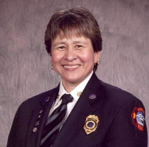 Image description: A portrait-style photo of Debra Amesqua in her fire chief uniform.