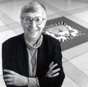 Image description: A black-and-white photo of Sister Joel Read crossing her arms.