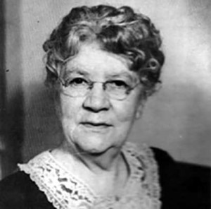 Image description: A black-and-white headshot of Bertha Reynolds.