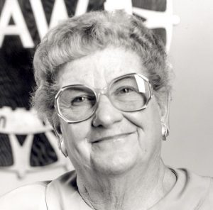 Image description: A black-and-white headshot of Doris Thom.