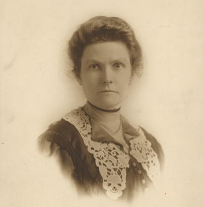 Image description: A black-and-white portrait-style photo of Ada James with faded edges.